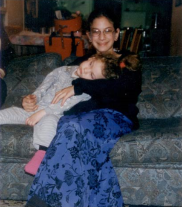 Holding her little sister, Haya Elisheva