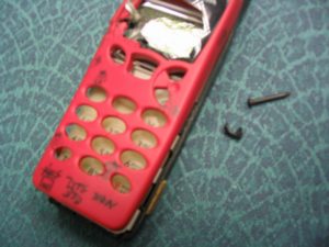 The police phoned to the Roth home immediately after the mourning week (the shiva) was over to say they had found Malki's cell phone in the wreckage of the Sbarro restaurant. Its ballistic nylon holder was shredded by the nails and other shrapnel; a nail and a fragment are at the right of the phone in this photo. On the phone itself, Malki had written: "Assur ledaber lashon harah"; a reminder (in Hebrew) to herself that it is improper to speak ill of other people.