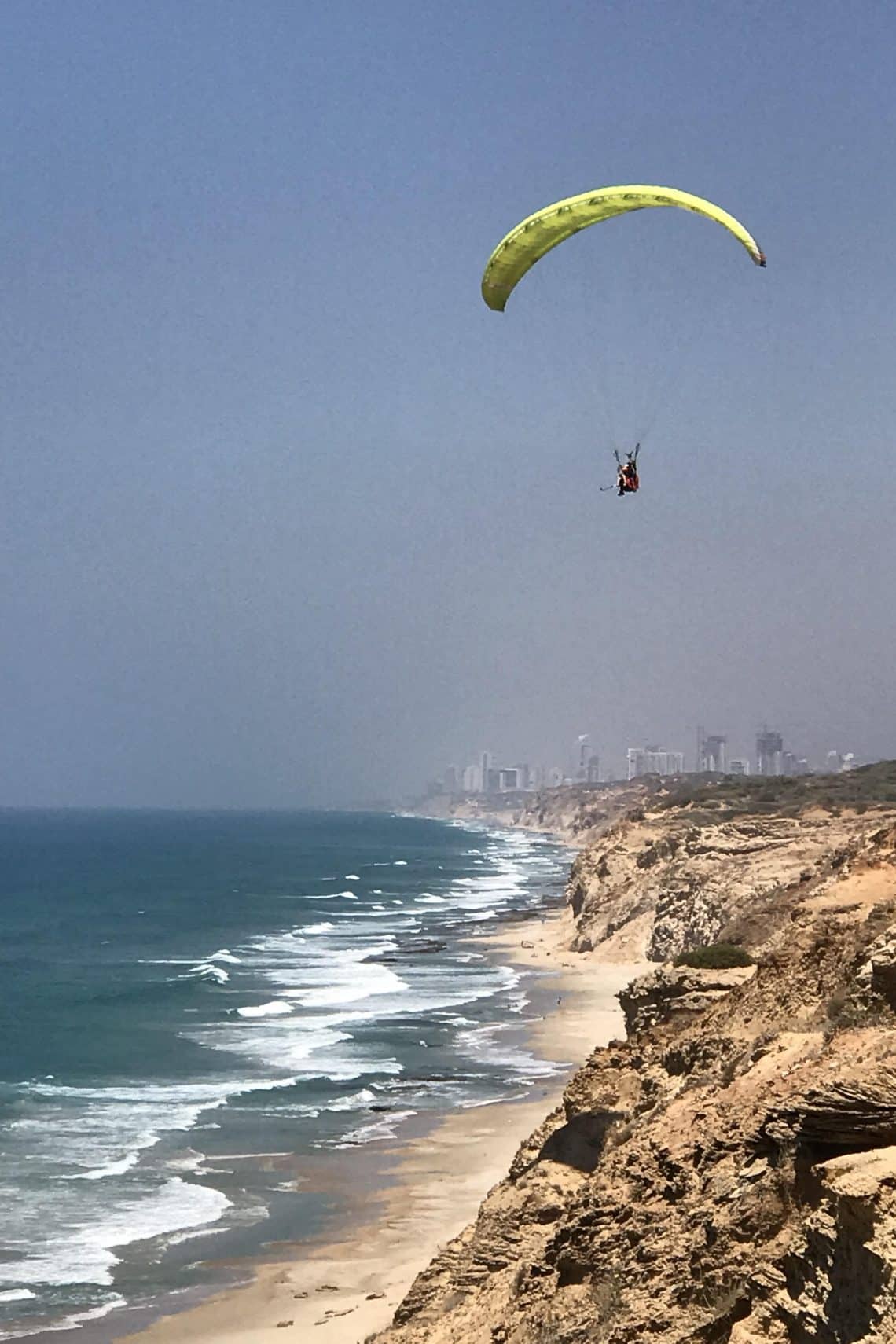 Paragliding over the Mediterranean Sea